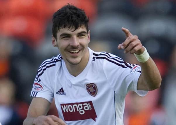 Callum Paterson celebrates after opening the scoring for Hearts