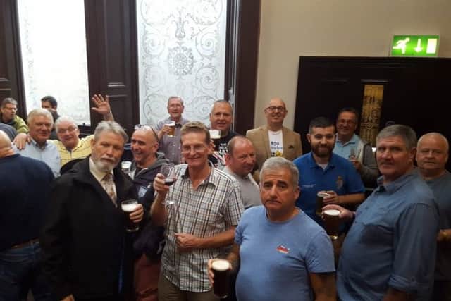 The group of Royal Navy veterans enjoying a drink in the Standing Order pub before being told to leave by security staff.