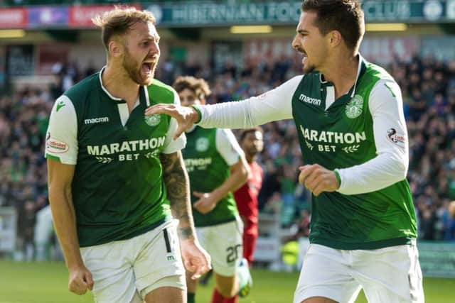 Boyle celebrates a goal with Jamie Maclaren - could the pair soon be international team mates as well? Picture: SNS Group