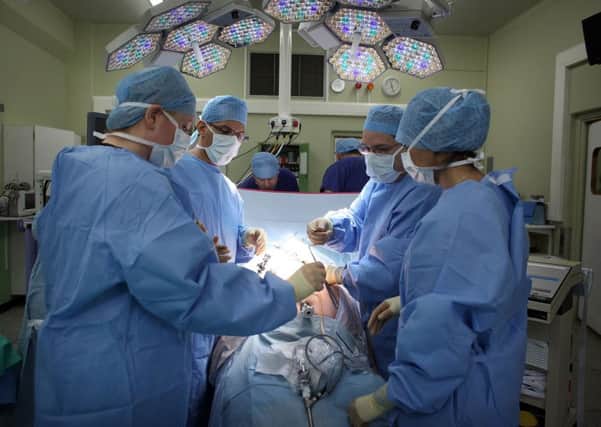 Susan fully expects her surgeons to kick cancer in the bahookie. Picture: Getty