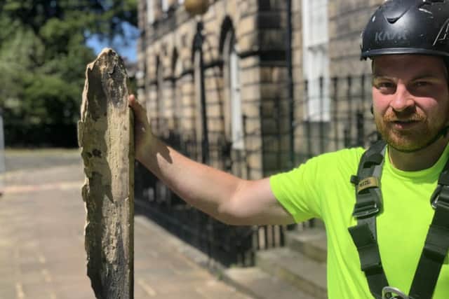 Stewart Inkster of Edinburgh Stonemasons Ltd
 shows the loose masonry from one of the city's buildings.