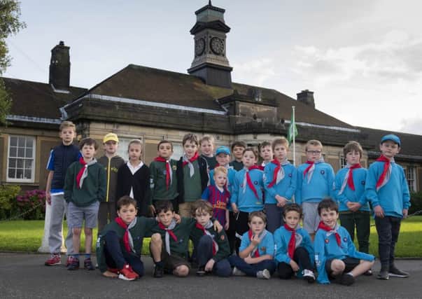 Children from the 14th Edinburgh and North East ENE Scouts Beavers and Cubs and the 51st Brownies outside the Royal High Primary School.