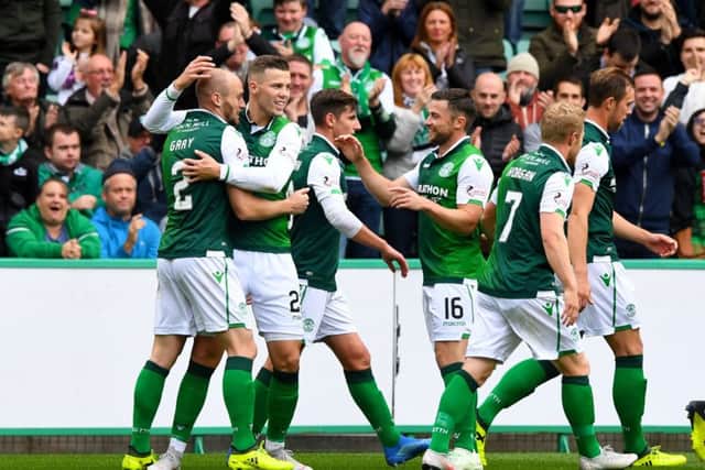 Will it be all smiles for the Hibs players at Dens this weekend? Picture: SNS Group