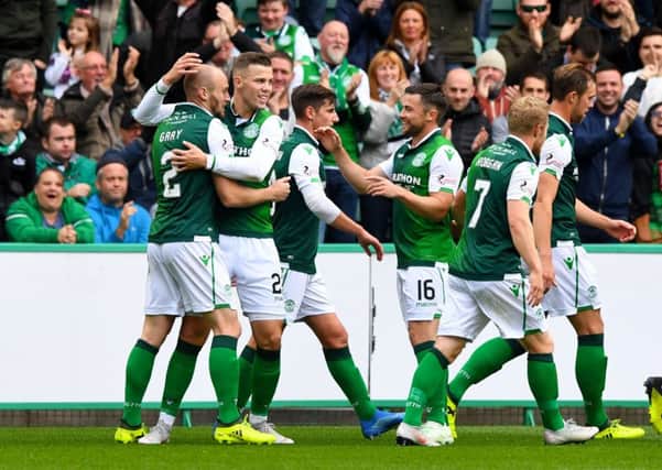 Will it be all smiles for the Hibs players at Dens this weekend? Picture: SNS Group