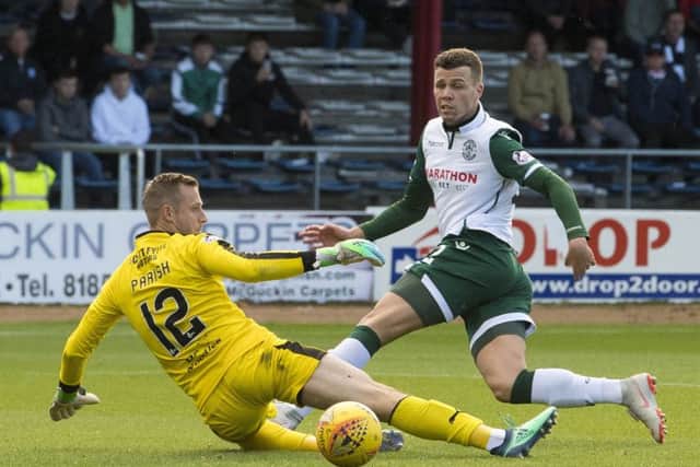 Florian Kamberi slips the ball beyond Elliott Parish for the opening goal at Dens Park. Picture: SNS Group