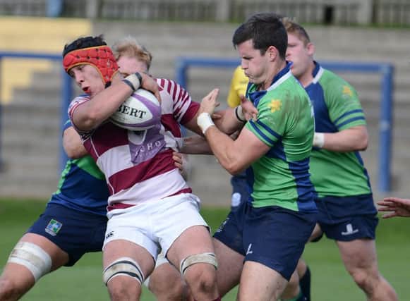 Jon Savage Photography
07762 580971
www.jonsavagephotography.com

22 ND  SEPTEMBER 2018

BOROUGHMUIR V WATSONIANS

WATSONIANS CONNOR BOYLE IS TACKLED BY CRAIG KEDDIE (BEHIND)