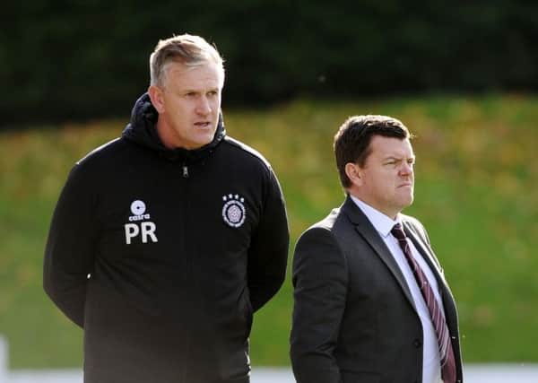 Linlithgow boss Mark Bradley, right, was not happy at his team's performance. Pic: Alan Murray