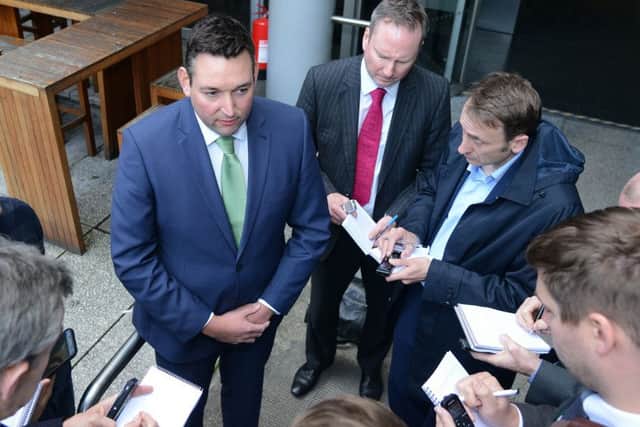 Miles Briggs speaks to reporters at a press conference. Picture: Jon Savage