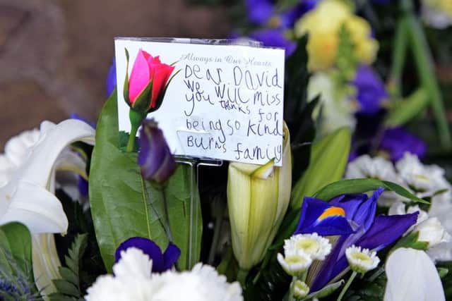 Flowers and tributes were laid out at the crematorium. Picture: Jon Savage