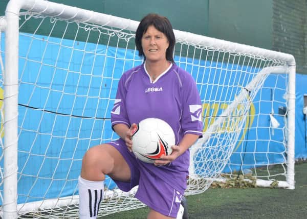 Carol suffered an abusive childhood and says football helped change her life for the better. Picture: Jon Savage