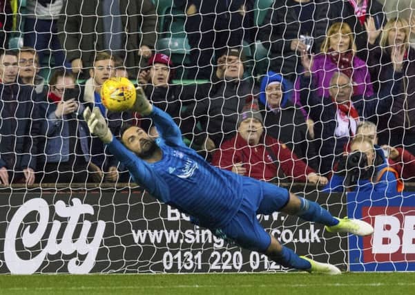 Joe Lewis saves Stevie Mallan's penalty