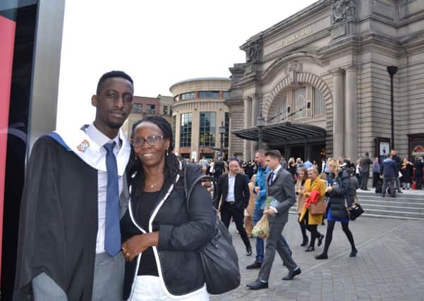 Benjamin Murenzi with his mother, Justine after graduation from Edinburgh colllege. Picture: Contributed