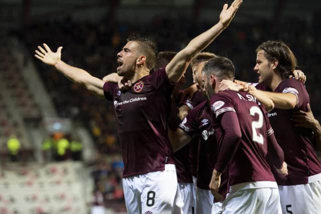 Olly Lee celebrates his goal to make it 3-2 to Hearts