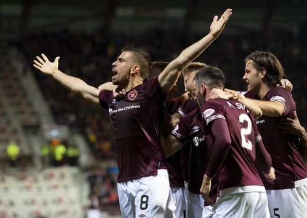 Olly Lee celebrates his goal to make it 3-2 to Hearts