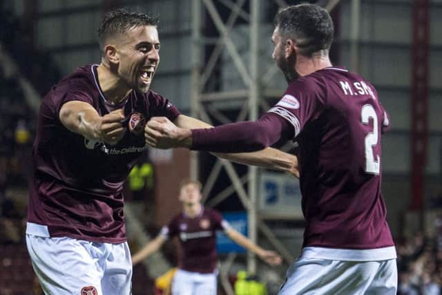 Olly Lee (left) celebrates with Michael Smith. Picture: SNS Group