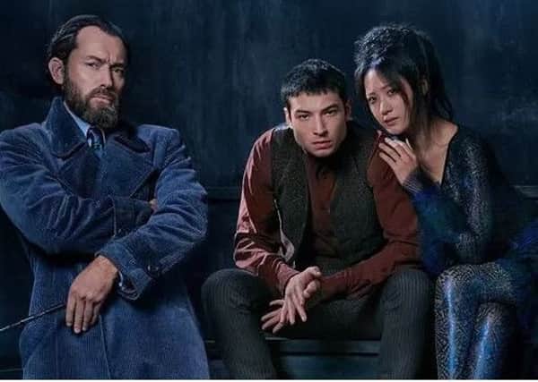 Jude Law as Albus Dumbledore, Ezra Miller as Credence and Claudia Kim plays a women who is cursed to turn into a snake in the second instalment of the franchise. Picture; PA