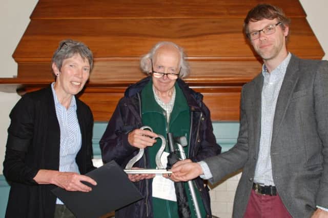 John Rogers being presented the Penicuik Turner Prize by judge Sandy Wood and Jackie McDonald, chair of Penicuik Community Arts Association.