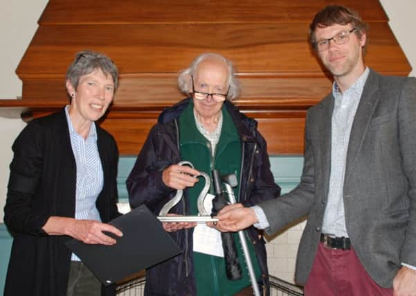 John Rogers being presented the Penicuik Turner Prize by judge Sandy Wood and Jackie McDonald, chair of Penicuik Community Arts Association.
