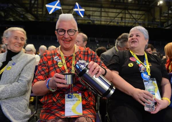 Delegates in upbeat mood at the SNP conference. Picture: SWNS