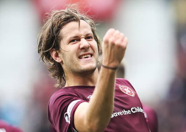 Peter Haring celebrates scoring the opening goal against St Johnstone