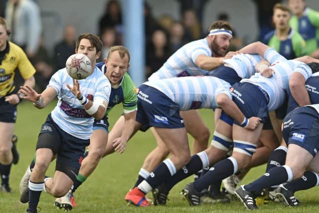 Tom
Wilson of Boroughmuir chases Robbie Davis of Edinburgh Accies. Picture: Neil Hanna