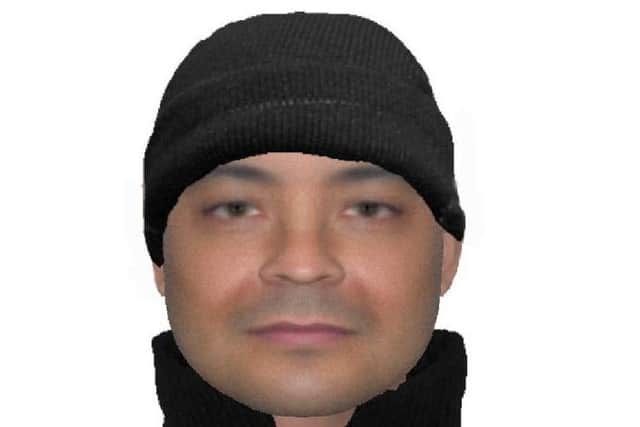 Police have released an e-fit of a man wanted in connection with an assault on Roseburn Terrace.