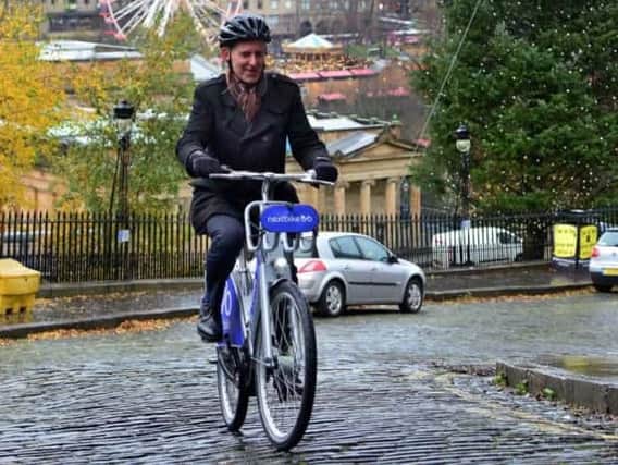 Electric bikes enable riders to pedal effortlessly up hills. Picture: Jon Savage