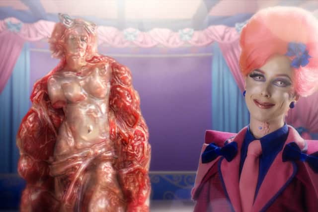 Rachel Maclean plays an un-named authoritarian diva presiding over the inmates of a 'brutalist candy-coloured dreamhouse' in Make Me Up.