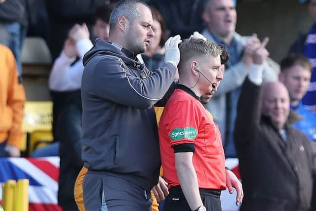 The back of assistant referee Calum Spences head after receiving treatment for a head injury. Picture; Getty