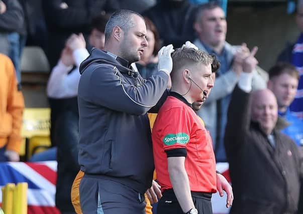 The back of assistant referee Calum Spences head after receiving treatment for a head injury. Picture; Getty