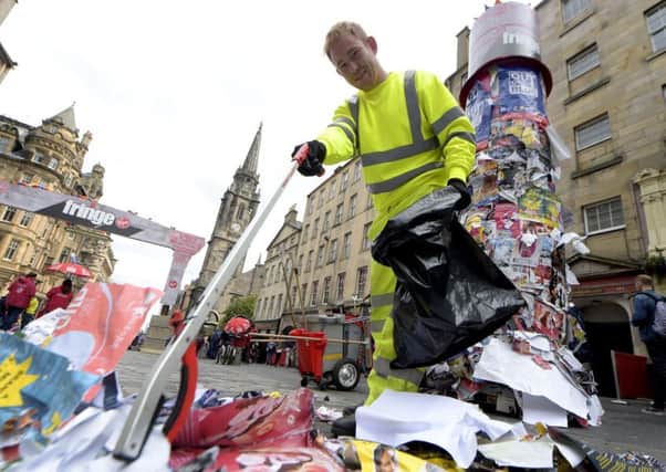 Flyposting in the Old Town requires a major clear-up every year. Picture: Lisa Ferguson