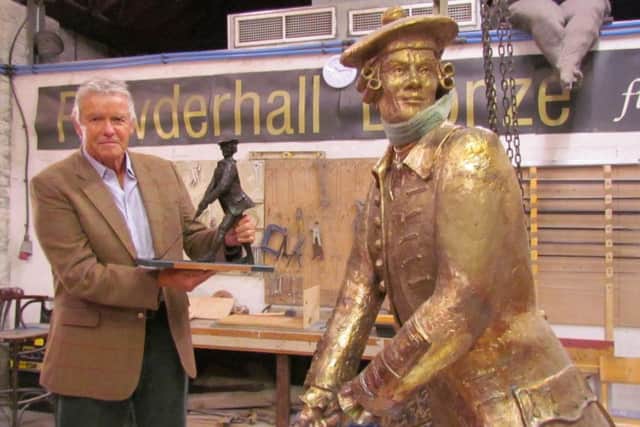 John Rattray statue and maquette held by David Anderson, who has been working with the Committee at Leith to help secure enough funds to enable the installation of the statue