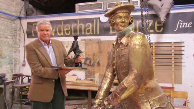 John Rattray statue and maquette held by David Anderson, who has been working with the Committee at Leith to help secure enough funds to enable the installation of the statue