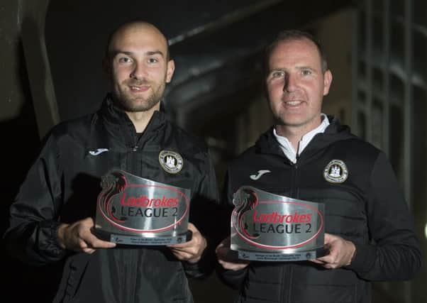 Conrad Balatoni and James McDonaugh collect the Ladbrokes League 2 Player and Manager of the Month Awards