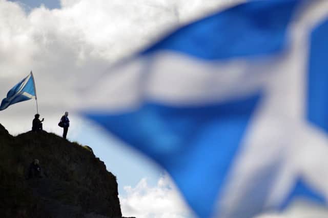 AUOB March for Independence
A couple of members of the march climbed up Arthurs Seat to watch the demonstration enter into Holyrood Park