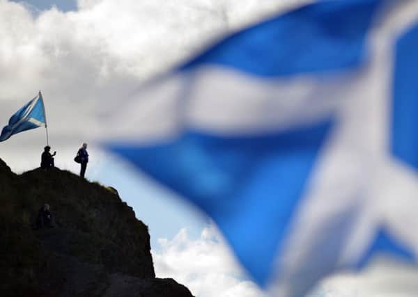 AUOB March for Independence

A couple of members of the march climbed up Arthurs Seat to watch the demonstration enter into Holyrood Park