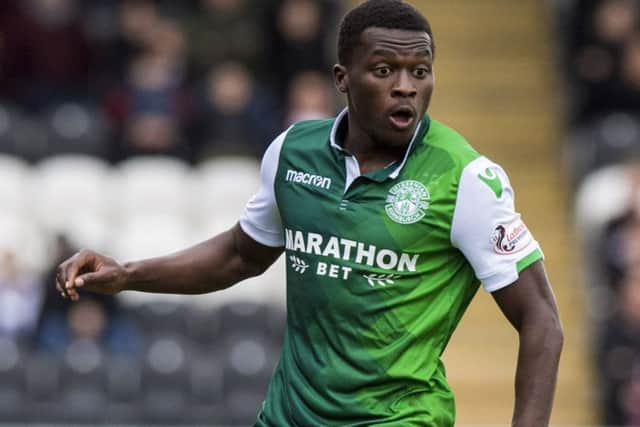 Thomas Agyepong in action for Hibs agianst St Mirren. The winger is likely to miss the trip to Celtic. Picture: SNS Group
