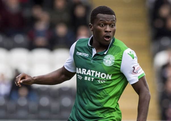 Thomas Agyepong in action for Hibs agianst St Mirren. The winger is likely to miss the trip to Celtic. Picture: SNS Group