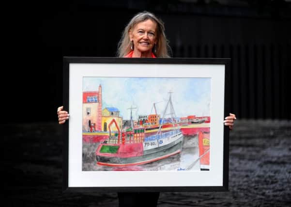 Helen Bellany, wife of the reknown Scottish artist John Bellany, with the painting 'Star of Hope'.