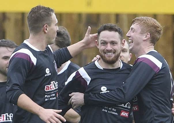 Ruari MacLennan celebrates scoring the first goal. Picture: Greg Macvean