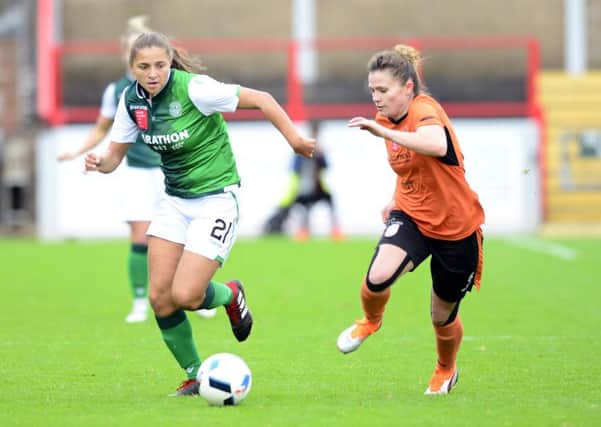 Hibs' Abi Harrison beats Glasgow City's Jo Love to set up another attack. Pic: Lorraine Hill