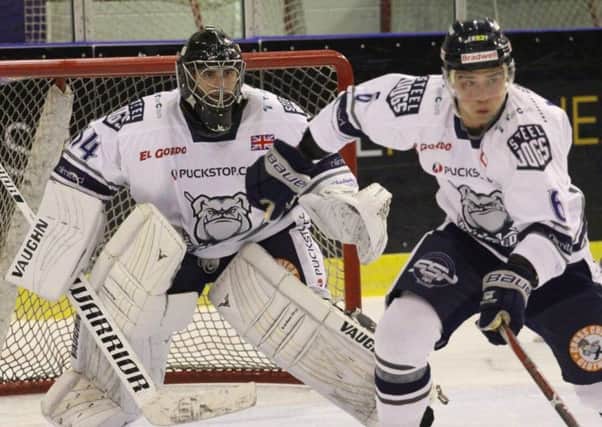 Steeldogs player coach, Ben Morgan, right, scored the second goal for the Sheffield team