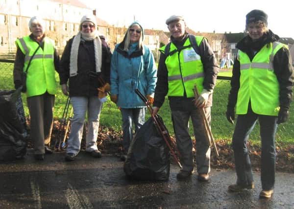 Jimmy Innes (second from right) on a litter pick.