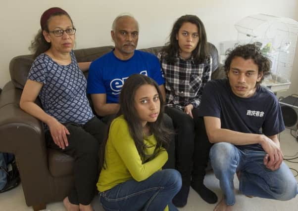 Claire, Peter, Marie, Chantal and Rene Dipnarine could be separated if their visa fees arent waived. Picture: Ian Rutherford