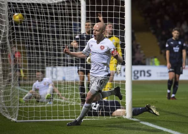 Steven Naismith celebrates scoring Hearts' second goal of the evening. Picture: SNS Group
