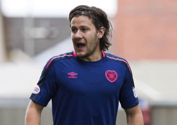 Peter Haring has missed Hearts' last two matches. Pic: SNS