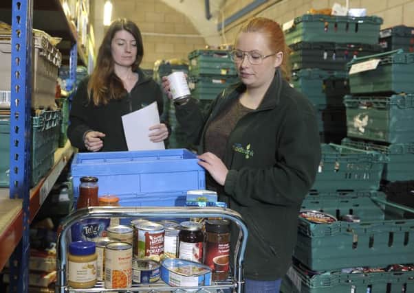 Bethany Monaghan, right, and Kaite Quinn at the Trussell Trust in Edinburgh. Picture: Neil Hanna/JP