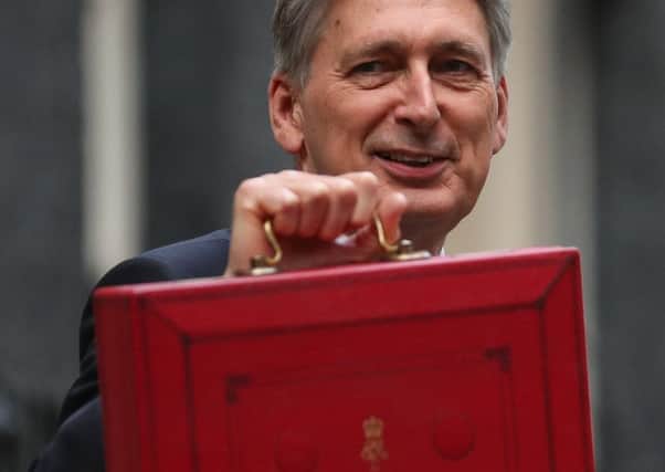 Philip Hammond could have billions to spend, says Brian Monteith. Picture: Daniel Leal-Olivas/AFP/Getty Images
