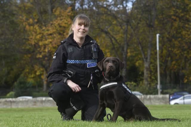 PC Julie Roy with the latest police recruit, PD Bear. Picture: Greg Macvean