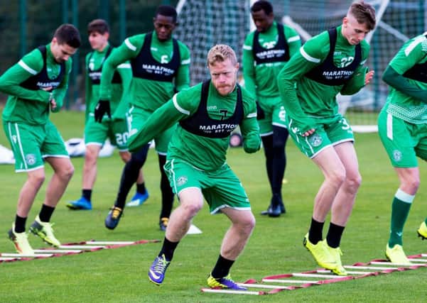 Hibs' Daryl Horgan gears up for the clash against Hearts in training. Pic: SNS